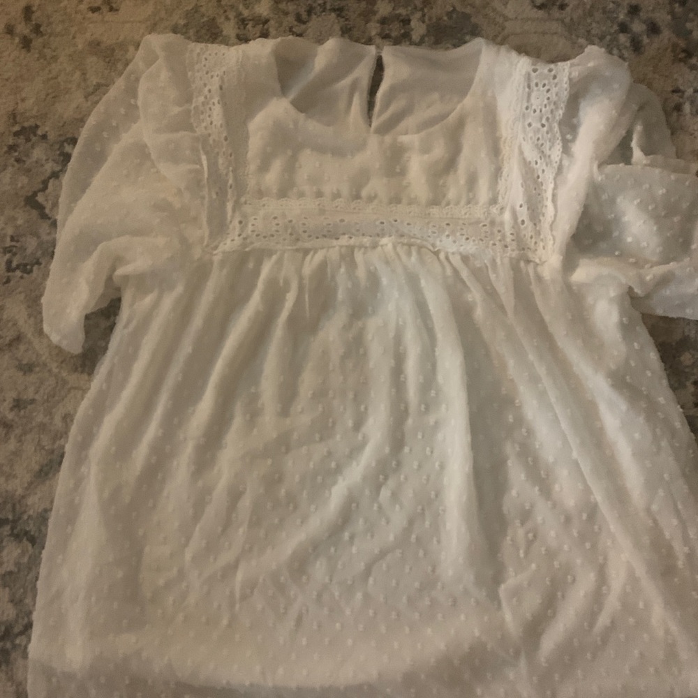 White sheer flowy blouse with short sleeves and button in back closure large